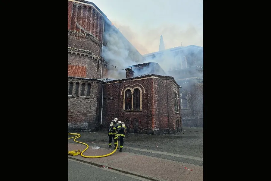 Firefighters respond to the fire at Saint-Pierre-Saint-Paul church, in Lille, France?w=200&h=150